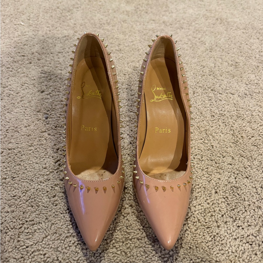 Christian Louboutin Anjalina 100
Patient Leather Pumps